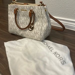 New white Michael Kors purse.